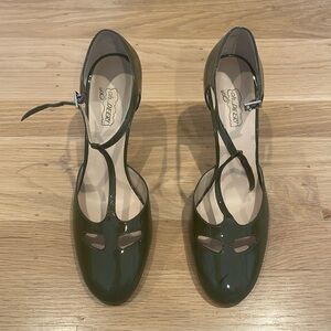 Green t-strap heels, old but never worn. Size 8.